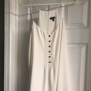 Lose fitting cream top